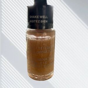 Illuminating Body Glow in Gold by [Brand]